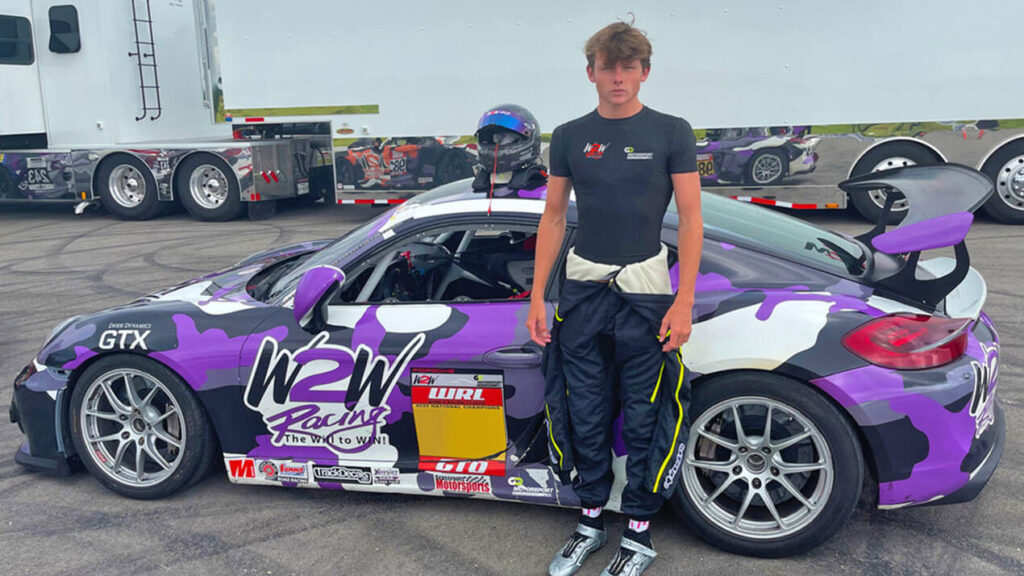 Aidan Kenny with his racing car