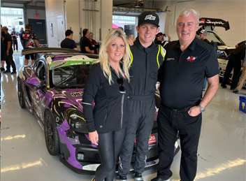 Aidan Kenny with his parents